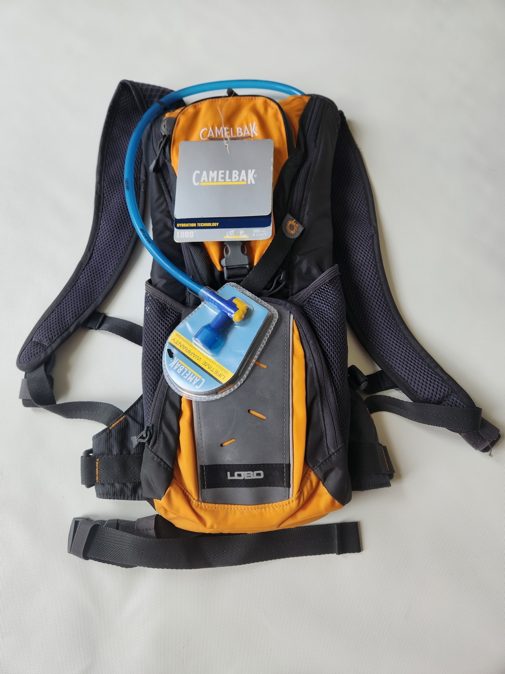 CamelBak Lobo Hydration Backpack in Orange and Black Venture Gear